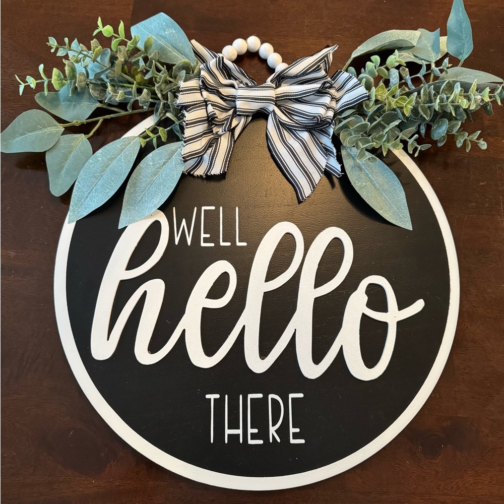 Black and White We'll Hello There Sign with Greenery and Bow